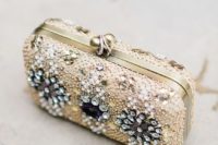 11 a jeweled bridal purse with gold and clear beads and rhinestones is a perfect glam statement