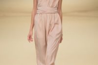 12 a nude one shoulder bridesmaid’s jumpsuit with cropped pants and stappy shoes