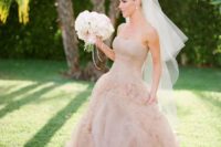 13 a strapless dusty pink wedding dress with a wrapped bodice, a layered tulle skirt for a formal bridal look