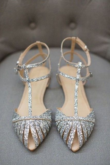 shiny silver flats with straps on top are chic and bold