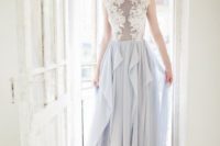 14 a cap sleeve wedding dress with a lace bodice and a layered light blue skirt looks ethereal