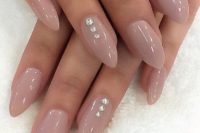 14 nude nails with just a little bling so it won’t compete with your ring
