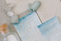 15 a chic coastal or beachside wedding invitation suite with watercolor invites in blues