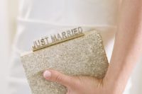 16 a sparkly gold sequin clutch with JUST MARRIED touch for a fun look