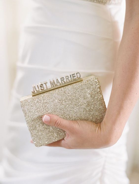 a sparkly gold sequin clutch with JUST MARRIED touch for a fun look