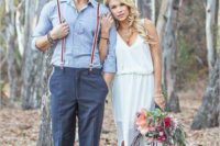 18 a rustic vintage groom outfit with a chambray shirt, navy pants, brown shoes, striped suspenders