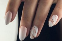 18 ombre French manicure with marble accents and rose gold accents for a trendy touch
