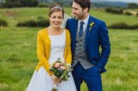 19 a groom in a blue suit and a tie and a bride wearing a yellow cardigan – the beauty is in details