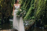 19 a woodland bridal portrait over the river looks really cool and amazing