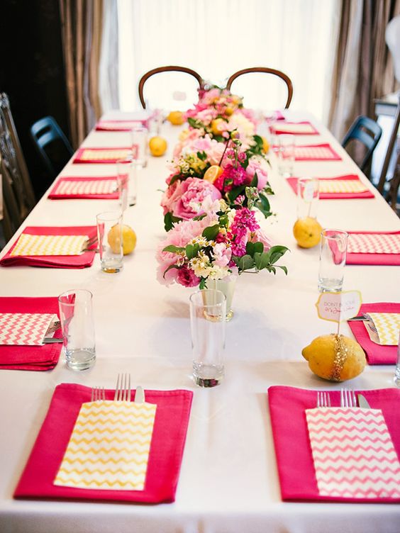 a glam pink and yellow tablescape with glitter touches and lemon card holders