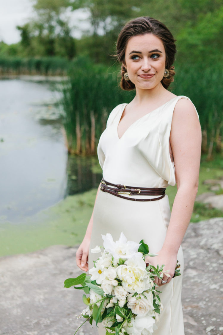 add a trendy and unusual touch to your bbridal look with a thin brown belt wrapped several times around the waist