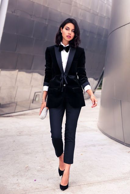 black cropped pants, a black velvet tuxedo, a bow tie and black shoes for a gorgeous bridesmaid's look