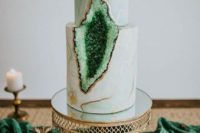 24 a gorgeous marble wedding cake with copper leaf and emerald geode for a trendy wedding