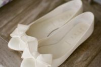 25 classic creamy flats with large bows are perfect for many bridal styles