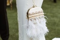 26 a super whimsy woven bridal clutch on a long loop, with fringe, pearls and leather cord detailing