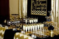 26 super glam black and gold bridal shower with a matching cocktail and dessert table