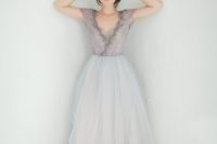 27 a subtle wedding dress with a lavender embellished bodice and a layered tull skirt with an ombre effect