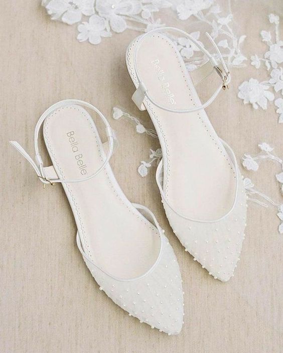 Beautiful semi sheer creamy bridal flats with pearls and ankle straps are amazing for a bridal look