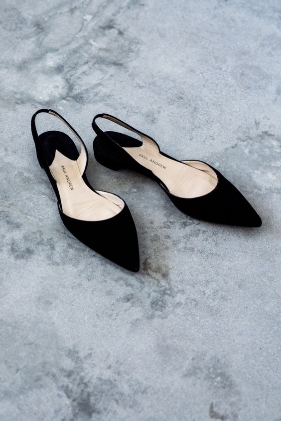 classy black velvet pointed toe slingbacks with no heels are great for a wedding and literally any other look, too