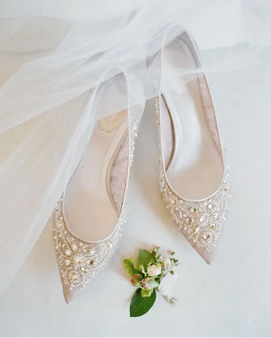 nude pointed toe heavily embellished flats are a chic option for any wedding