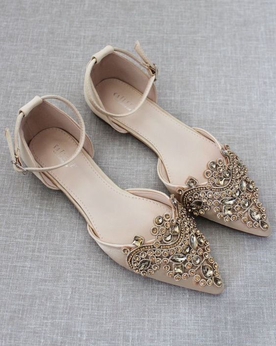 nude wedding flats with heavy embellishments on the tops and ankle straps are a chic idea for a glam bridal look