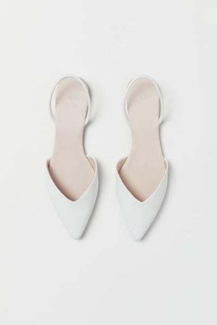 Ultra minimalist white bridal flats with pointed toes are amazing for any bridal look and can be worn afterwards, too