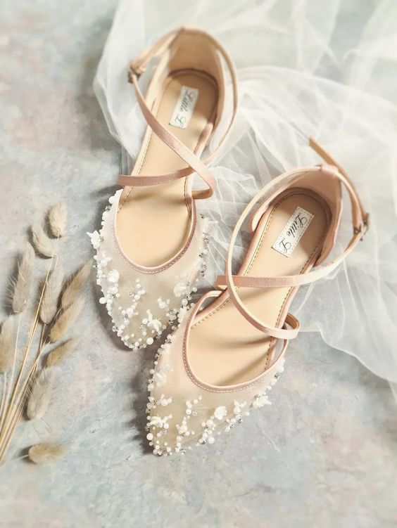 very chic and delicate semi-sheer flats with pearls and rhinestones and criss cross blush straps are adorable