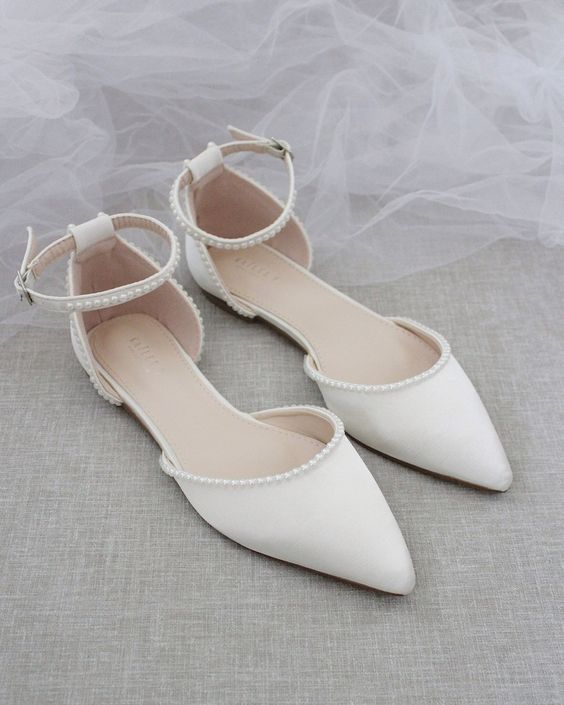 white wedding flats with little pearls along the edges are a lovely idea for a spring or summer bridal look