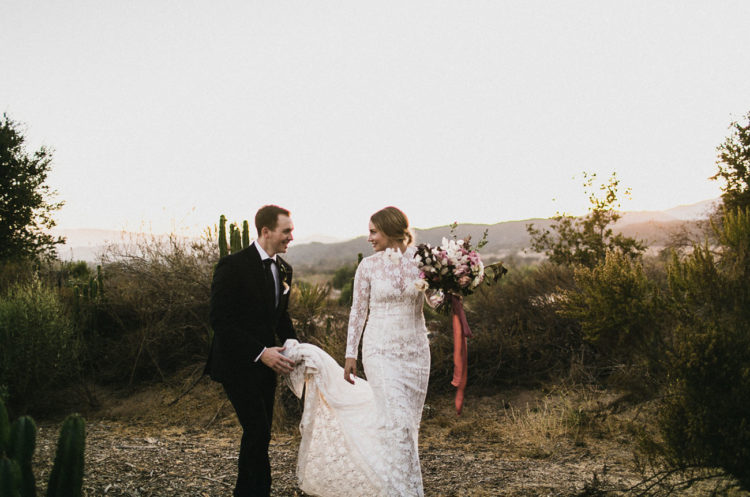 This boho meets modern moody wedding is full of love and moody touches for a desert at sunset look