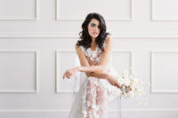 This modern romantic bridal shoot is inspired by spring and blooms and is filled with textures and neutrals