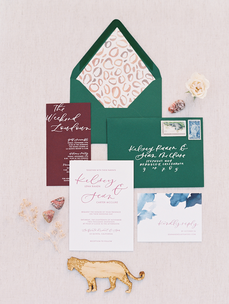 The wedding stationery was done in emerald and burgundy with a cheetah print to highlight the boho feel