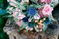 02 a cute bouquet with blue thistles, soft pink garden roses and some greenery for a sweet summer look