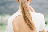 02 a gorgeous sleek twisted ponytail is the best option for a minimalist bride
