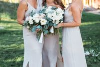 02 mismatching off-white bridesmaids’ dresses with side slits and spaghetti straps for an airy feel