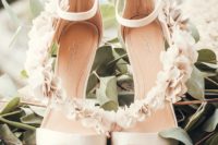 03 The bride was wearing neutral wedding shoes with ankle straps and with florals