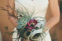 03 a gorgeous wedding bouquet with an air plant, a succulent, herbs and fuchsia blooms for a statement
