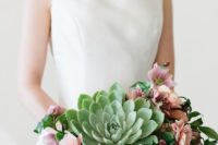 04 a modern wedding bouquet with an oversized green succulent, pink and fuchsia blooms