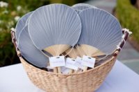 04 fan wedding favors is an elegant and inexpensive way to take care of your guests on a hot day