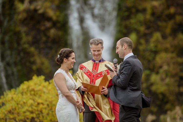 The ceremony took place in front of a waterfall