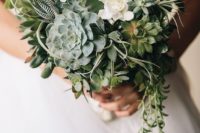 05 a chic wedding bouquet with various succulents, air plants, white blooms and cascading vines