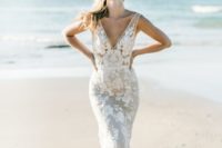 05 a gorgeous sheath wedding dress with thick straps, a deep V-neckline and lace appliques for a glam statement