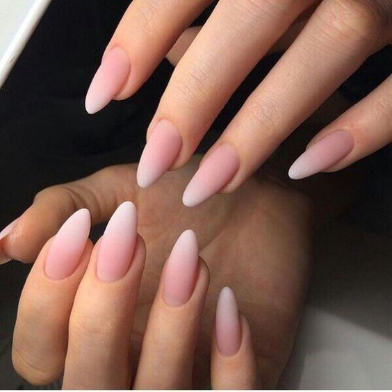 ombre French nails with an almond shape for a chic and edgy feel yet with a classic sense