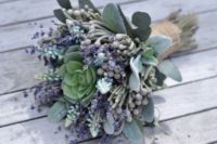 06 a chic pale wedding bouquet with lavender, berries and a succulent in the middle