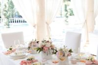 06 a super elegant tablescape with light pink and gold touches plus fresh blooms and greenery, little wine bottles as favors