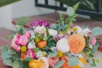 08 a colorful bouquet with purple, pink, orange and blush blooms and lots of ferns and eucalyptus