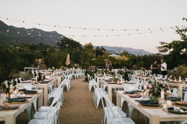 The wedding reception was outdoor, the space was done with lights