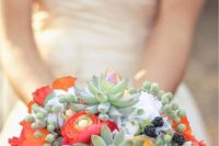 09 a wedding bouquet with succulents, berries, orange and red blooms for a summer bride