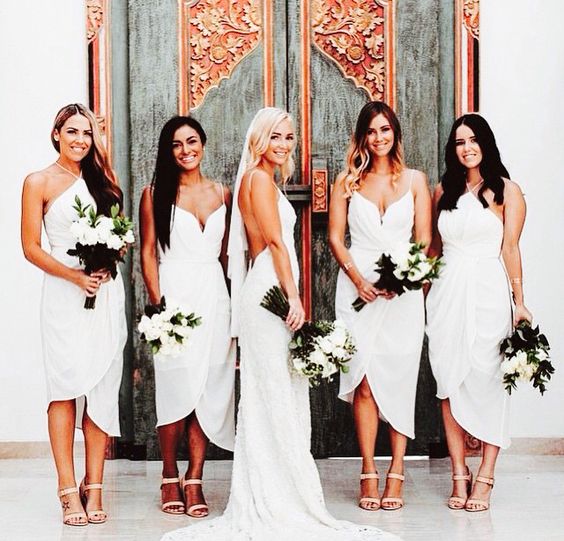 white wrap dresses with a halter neckline or with a plunging one and spaghetti straps look wow