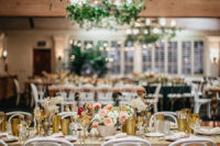 10 The wedding venue was decorated with greens, delicate florals and gilded touches
