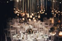 11 The wedding reception space was illuminated with small candle holders and crystals